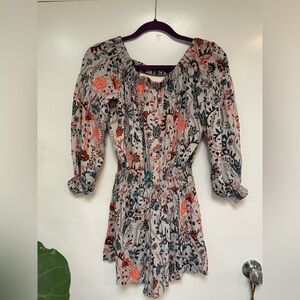 Free people off the shoulder open back romper. Beautiful floral print.